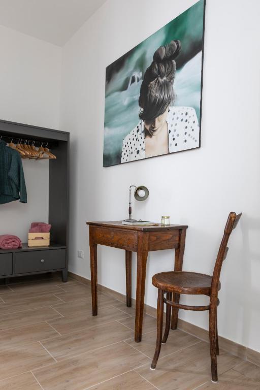 A bed or beds in a room at Casa Otto