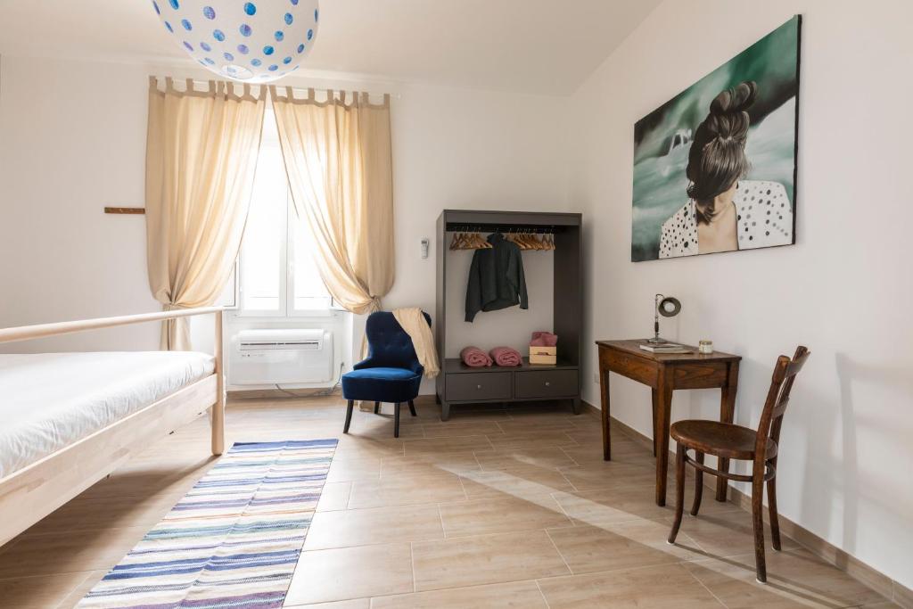 A bed or beds in a room at Casa Otto