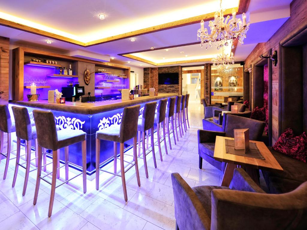 TV a/nebo společenská místnost v ubytování Hotel Ferienglück