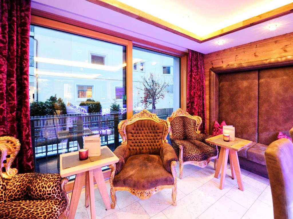 Posezení v ubytování Hotel Ferienglück