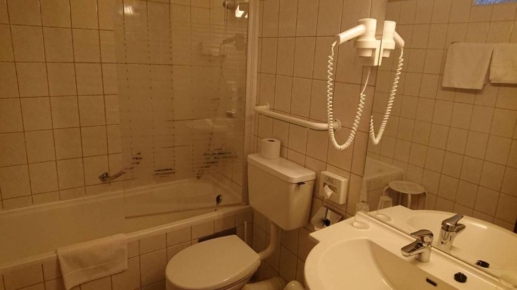 Koupelna v ubytování Hotel Alpenrose