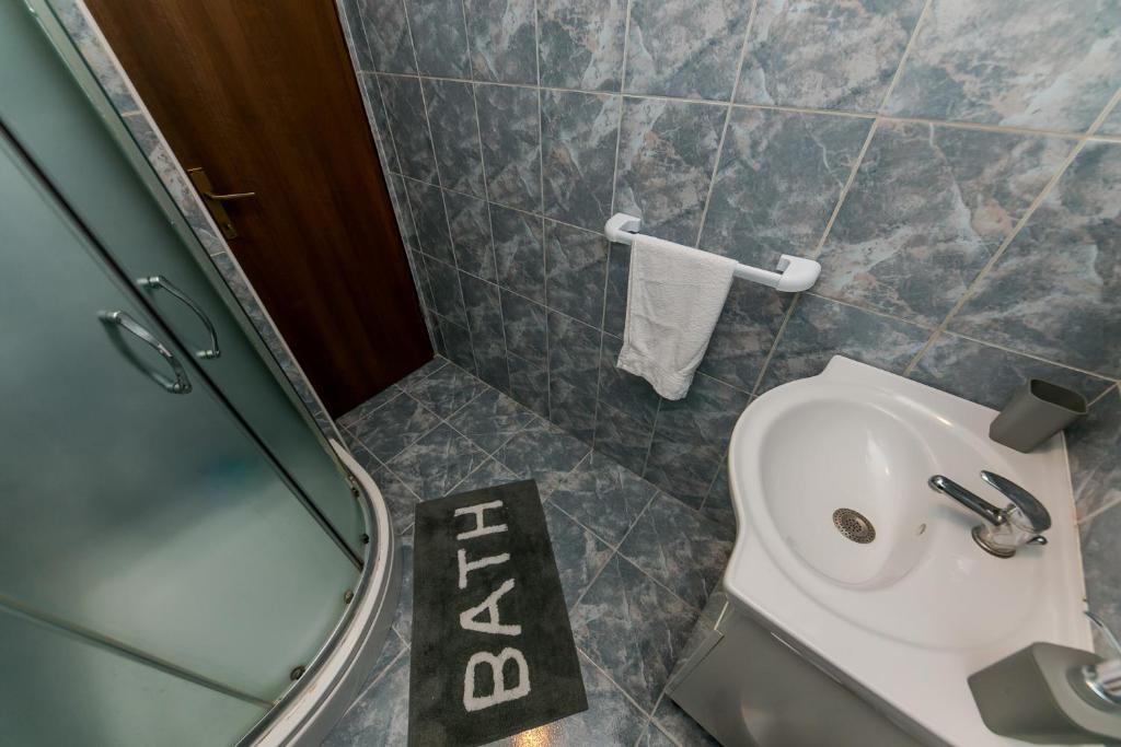 Koupelna v ubytování Apartments Vukman