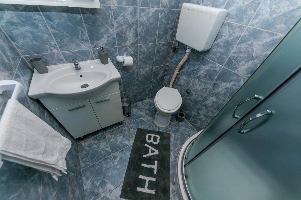 Koupelna v ubytování Apartments Vukman