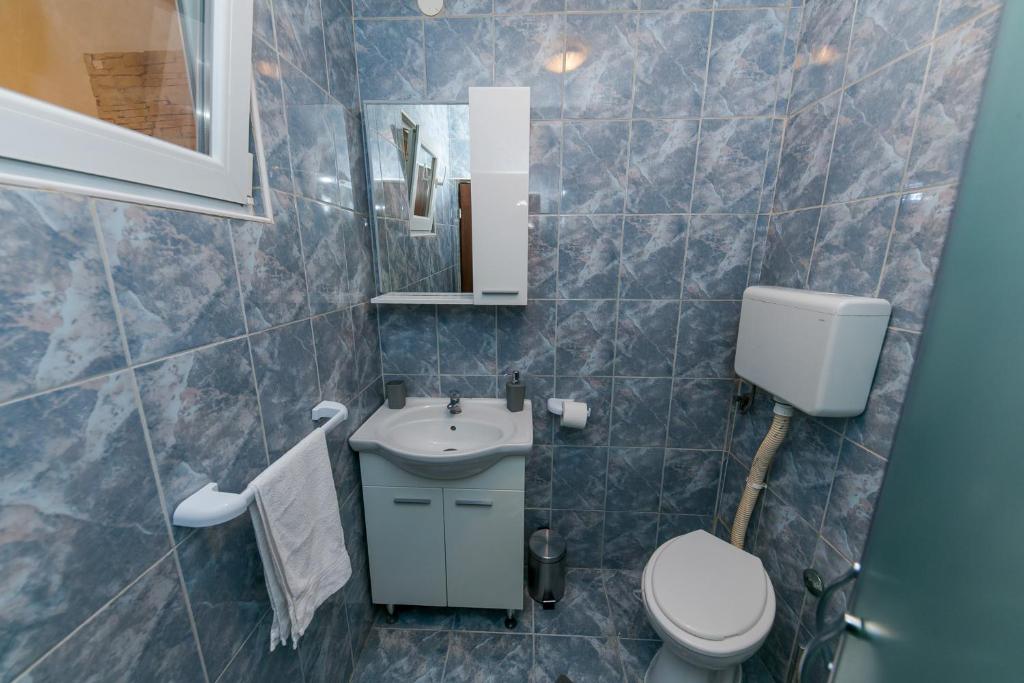 Koupelna v ubytování Apartments Vukman