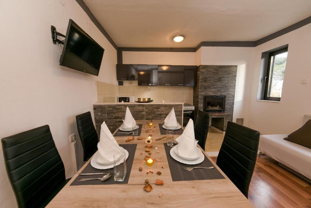 Kuchyň nebo kuchyňský kout v ubytování Apartments Vukman