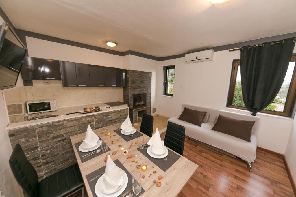 Kuchyň nebo kuchyňský kout v ubytování Apartments Vukman