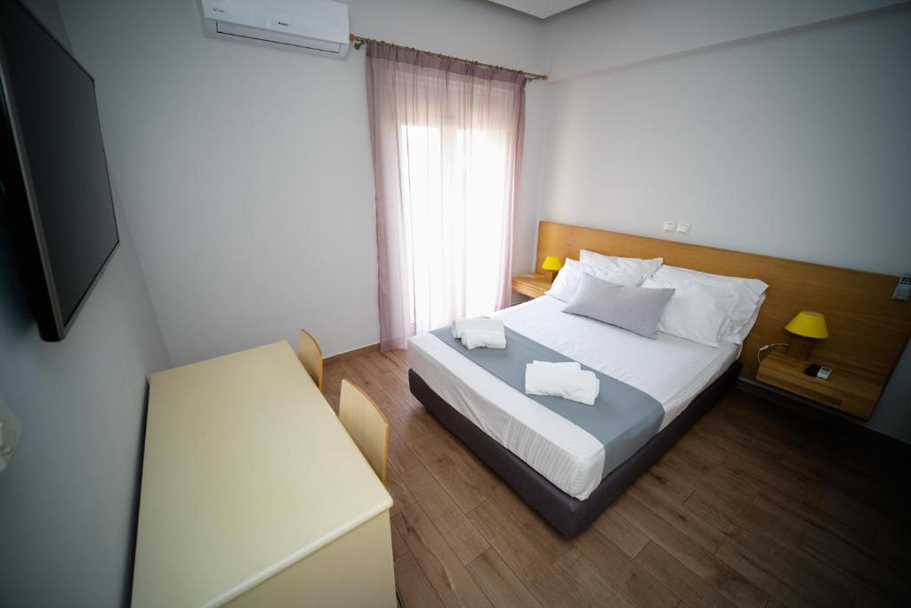 Posteľ alebo postele v izbe v ubytovaní Sappho Studios