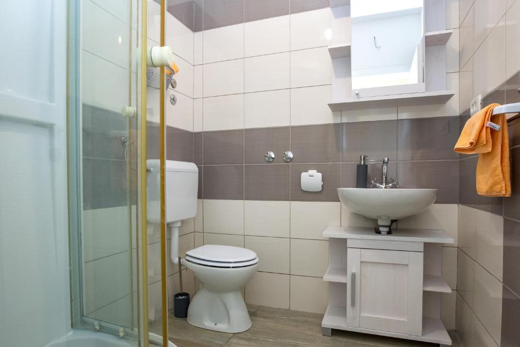 Koupelna v ubytování Apartments Luka