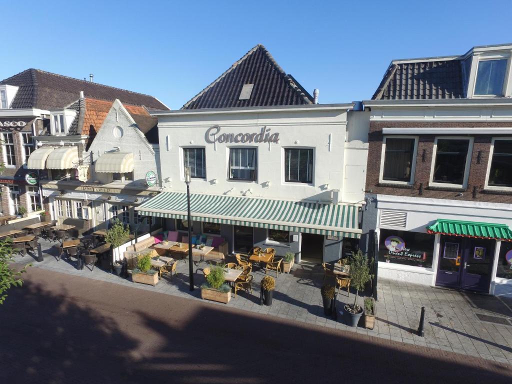 an overhead view of a building with a restaurant at Hostel 45 in Purmerend
