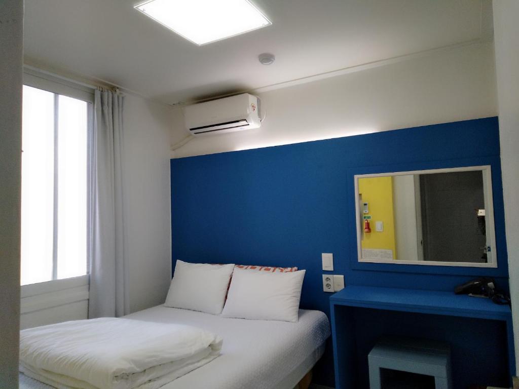 Postel nebo postele na pokoji v ubytování Slow Citi Guest House -슬로시티게스트하우스