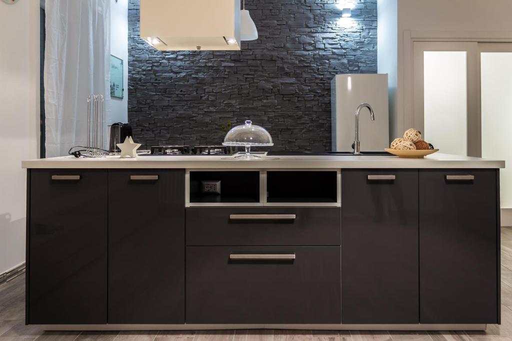 Kuchyň nebo kuchyňský kout v ubytování Maison Lidia