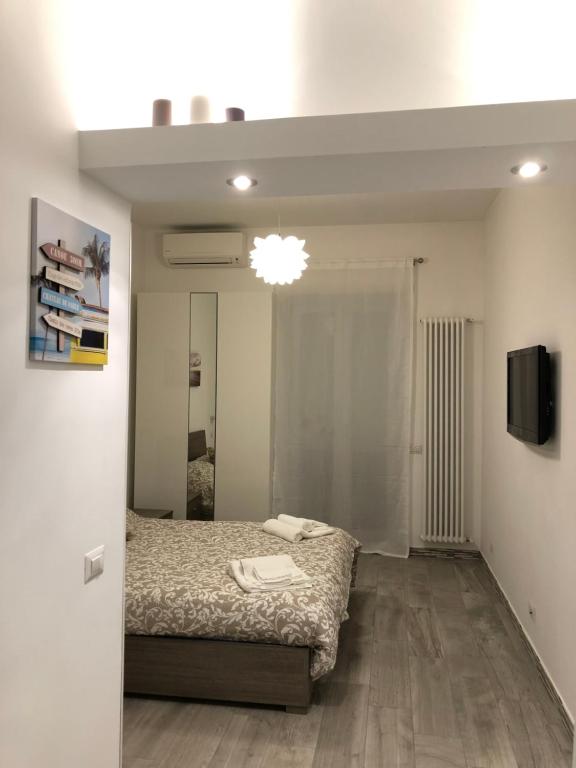 Postel nebo postele na pokoji v ubytování Maison Lidia