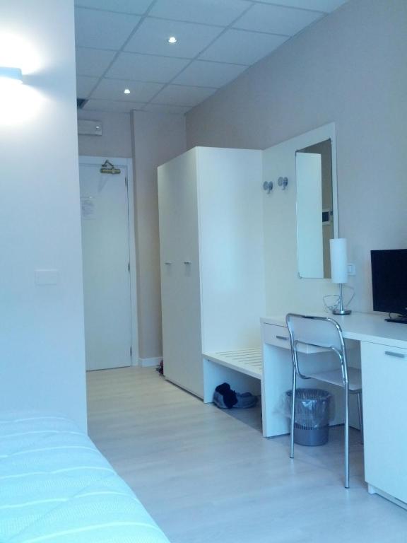 TV a/nebo společenská místnost v ubytování Hotel Cremona Viale