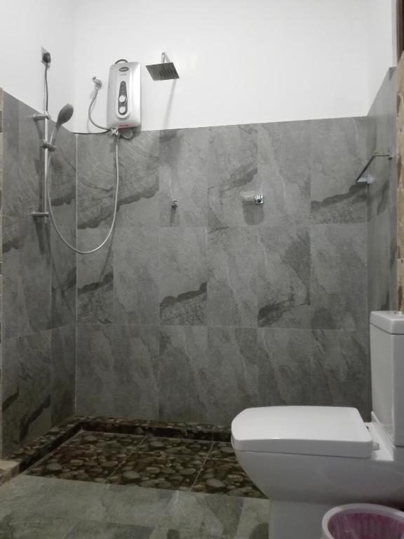 Koupelna v ubytování Neo Grand Villa