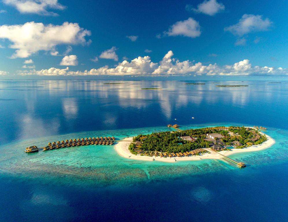an island in the middle of the ocean at Kudafushi Resort & Spa in Raa Atoll