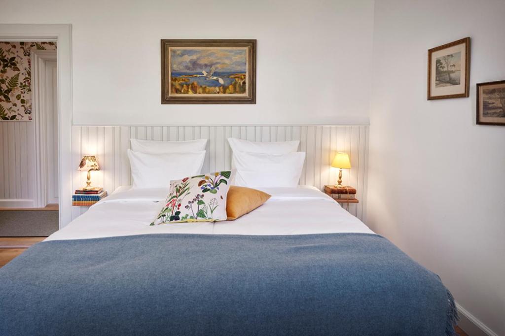 Postel nebo postele na pokoji v ubytování Hotel Hornbækhus