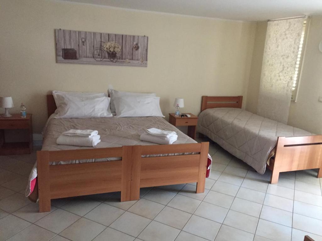 Posteľ alebo postele v izbe v ubytovaní Zagarella House