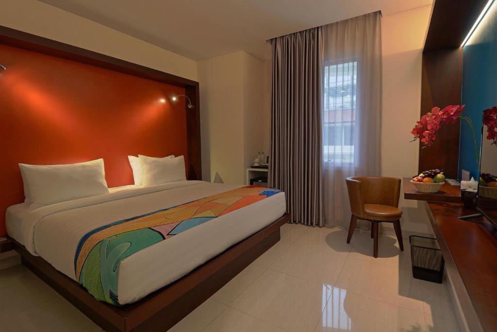 Postel nebo postele na pokoji v ubytování Grand Picasso Hotel