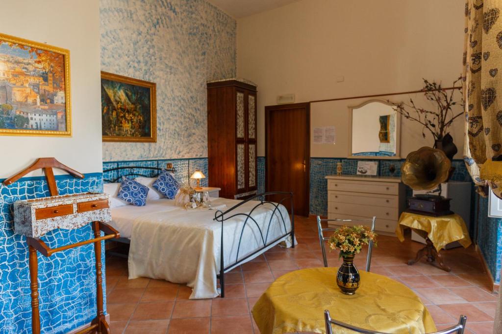 Postelja oz. postelje v sobi nastanitve Hotel Residence Confalone