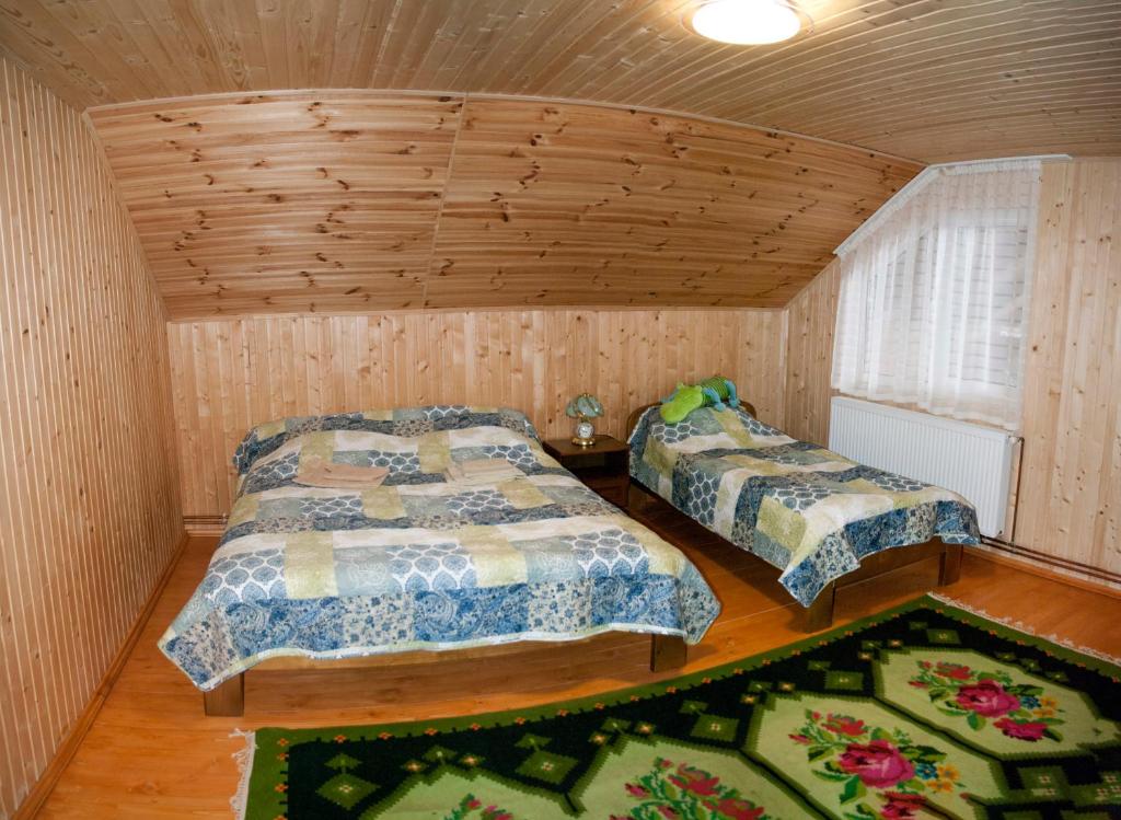 Postel nebo postele na pokoji v ubytování У Гриніва