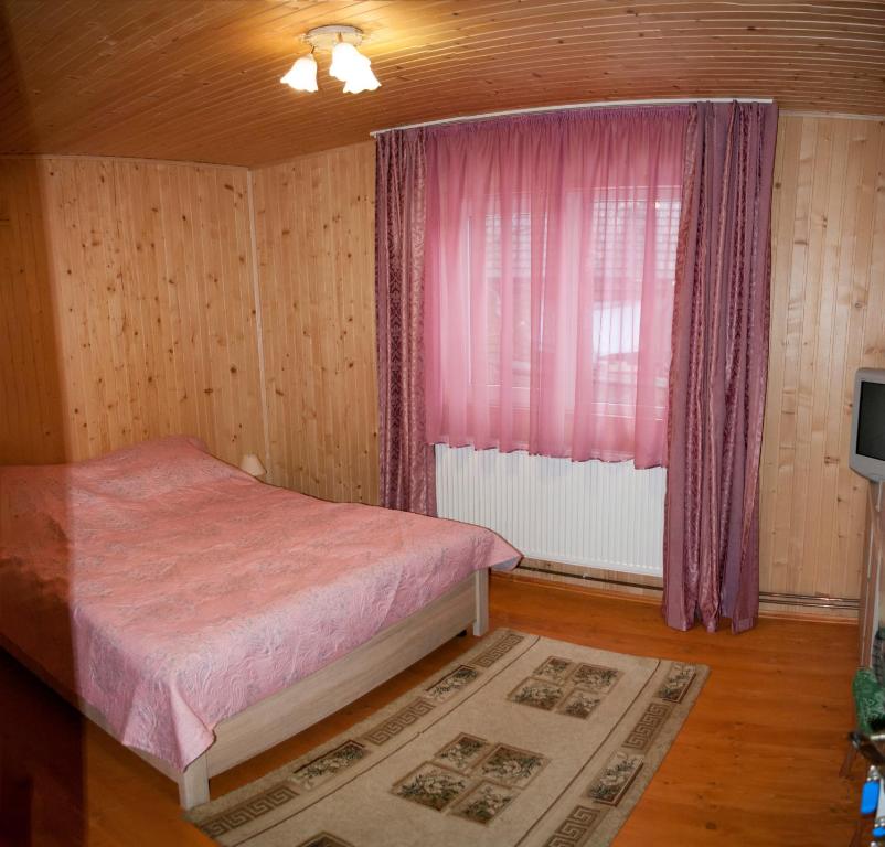 Postel nebo postele na pokoji v ubytování У Гриніва