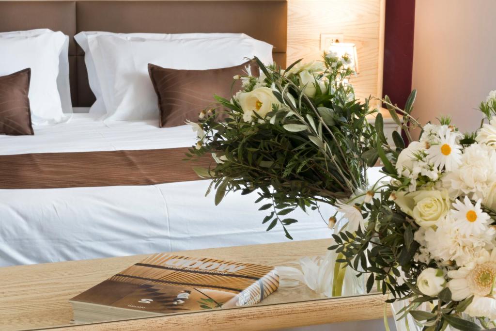 Posteľ alebo postele v izbe v ubytovaní Hotel Soleluna