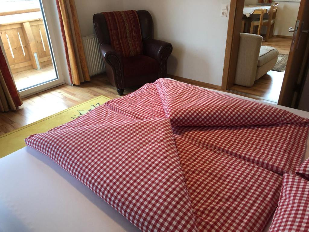 Letto o letti in una camera di Pension Waldegg