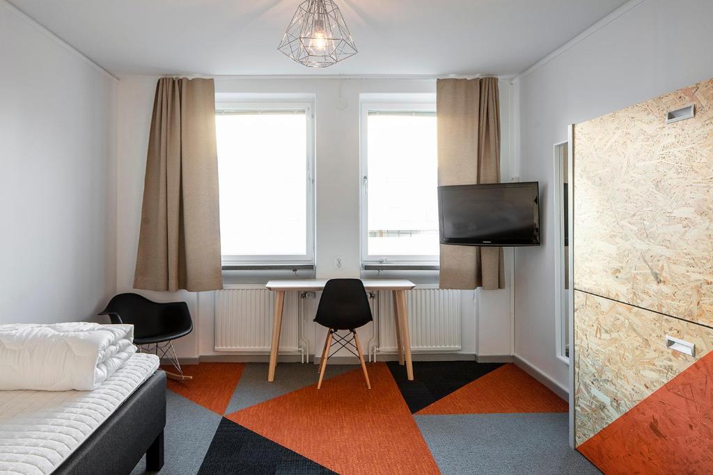 TV a/nebo společenská místnost v ubytování Norrland YMCA Hostel Umeå