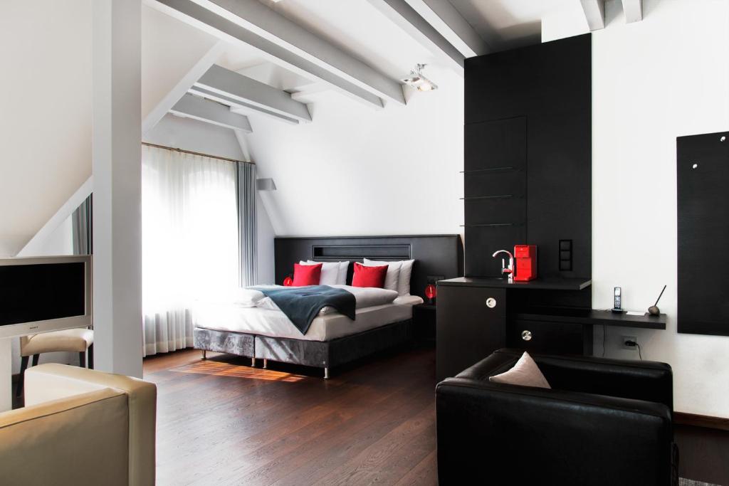 Postel nebo postele na pokoji v ubytování niXe Boutiquehotel & Spa
