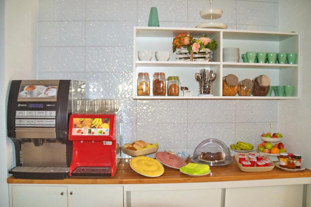 Kuchyň nebo kuchyňský kout v ubytování Ouril Hotel Julia