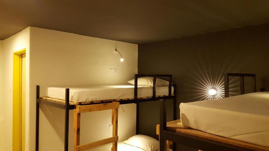 Postel nebo postele na pokoji v ubytování Revopackers Beds and Bunks