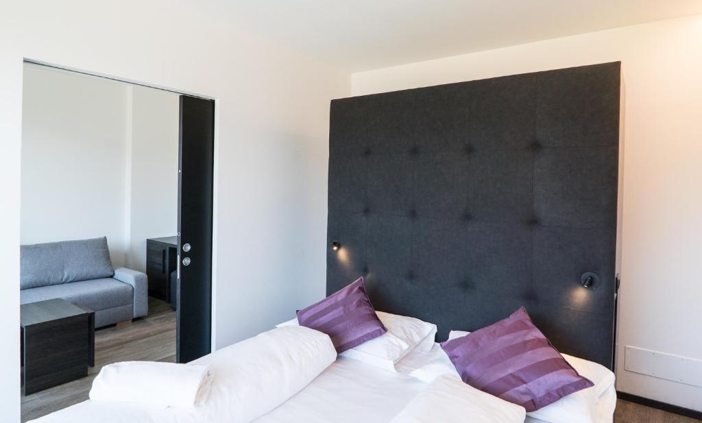 Postel nebo postele na pokoji v ubytování Hotel Raffl