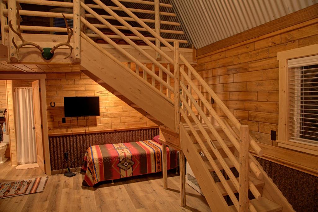 Postel nebo postele na pokoji v ubytování K3 Guest Ranch