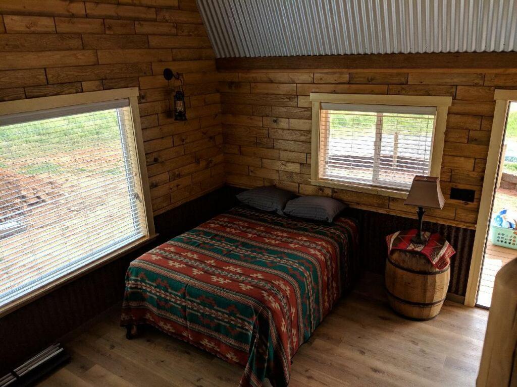 Postel nebo postele na pokoji v ubytování K3 Guest Ranch
