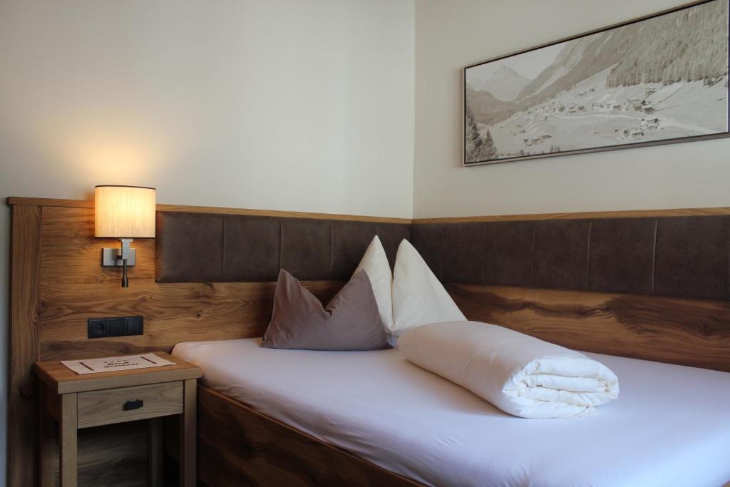 Postel nebo postele na pokoji v ubytování Hotel Glöckner und Hotel Residenz Glöckner
