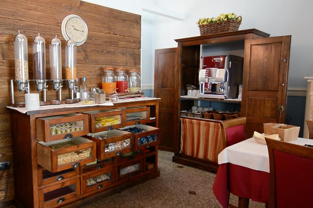 Kuchyň nebo kuchyňský kout v ubytování Hotel Risi