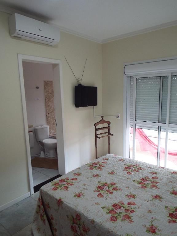  Casa 3 dormitórios sendo uma suíte com ar