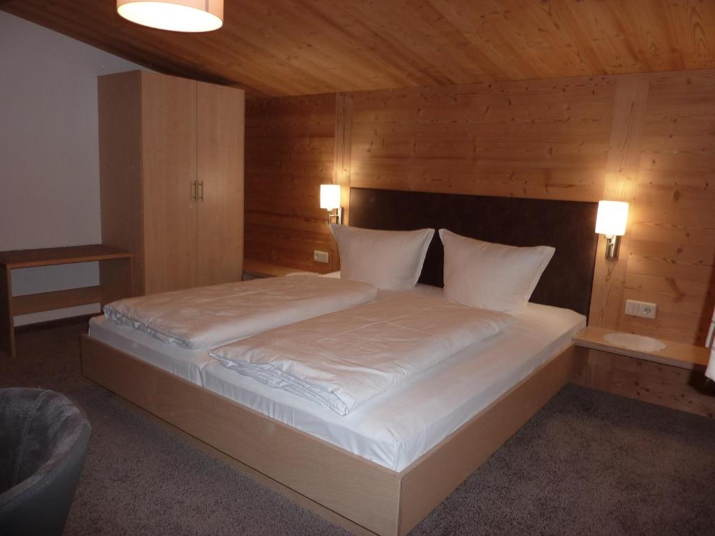 Postel nebo postele na pokoji v ubytování Haus Christopherus