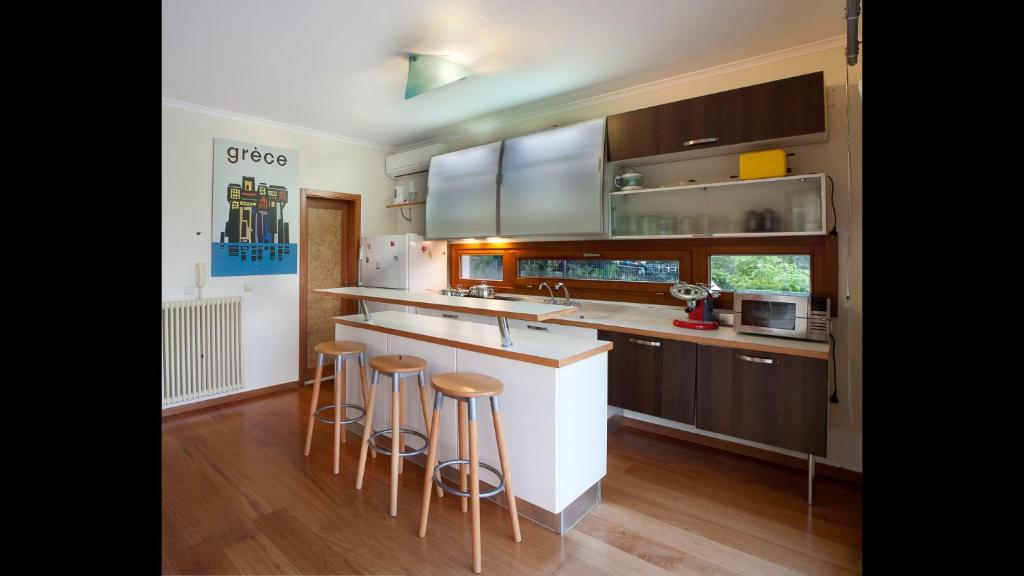 Kuchyň nebo kuchyňský kout v ubytování Villa Orgoni