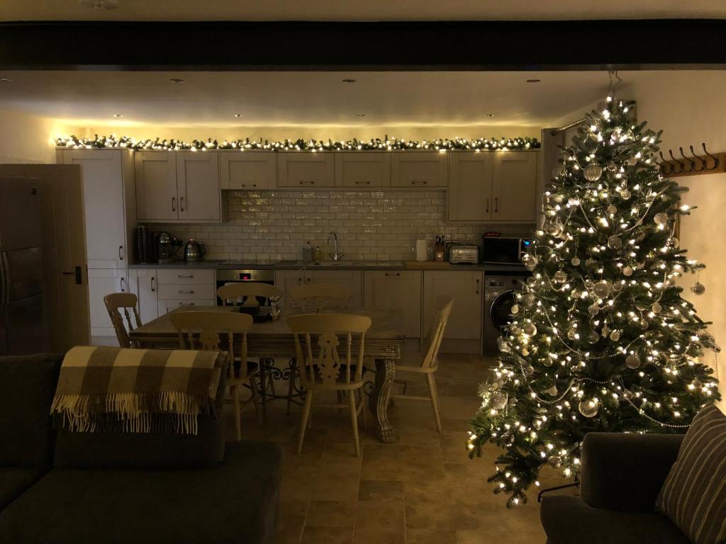 Kuchyň nebo kuchyňský kout v ubytování Camerton Inn Cottage