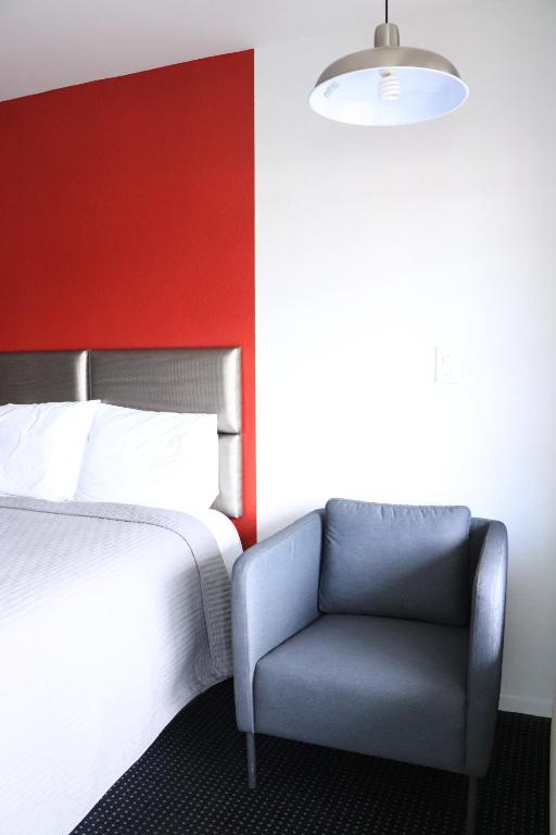 Postel nebo postele na pokoji v ubytování University Inn