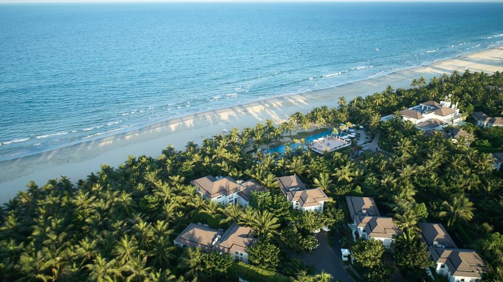 an aerial view of a resort near the beach at Premier Village Danang Resort Managed By Accor in Danang