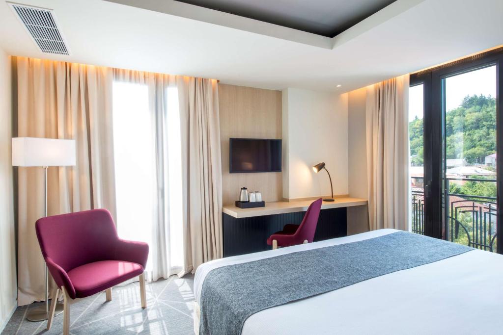 Postel nebo postele na pokoji v ubytování Best Western Kutaisi City Center