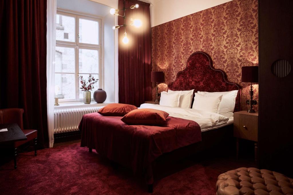 Postel nebo postele na pokoji v ubytování NOFO Hotel, WorldHotels Crafted