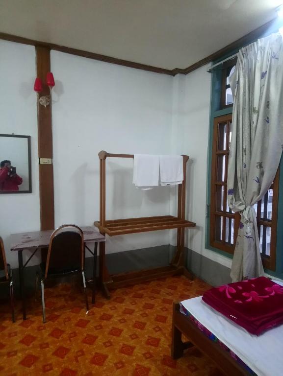 Postel nebo postele na pokoji v ubytování Diamond Star Guest House