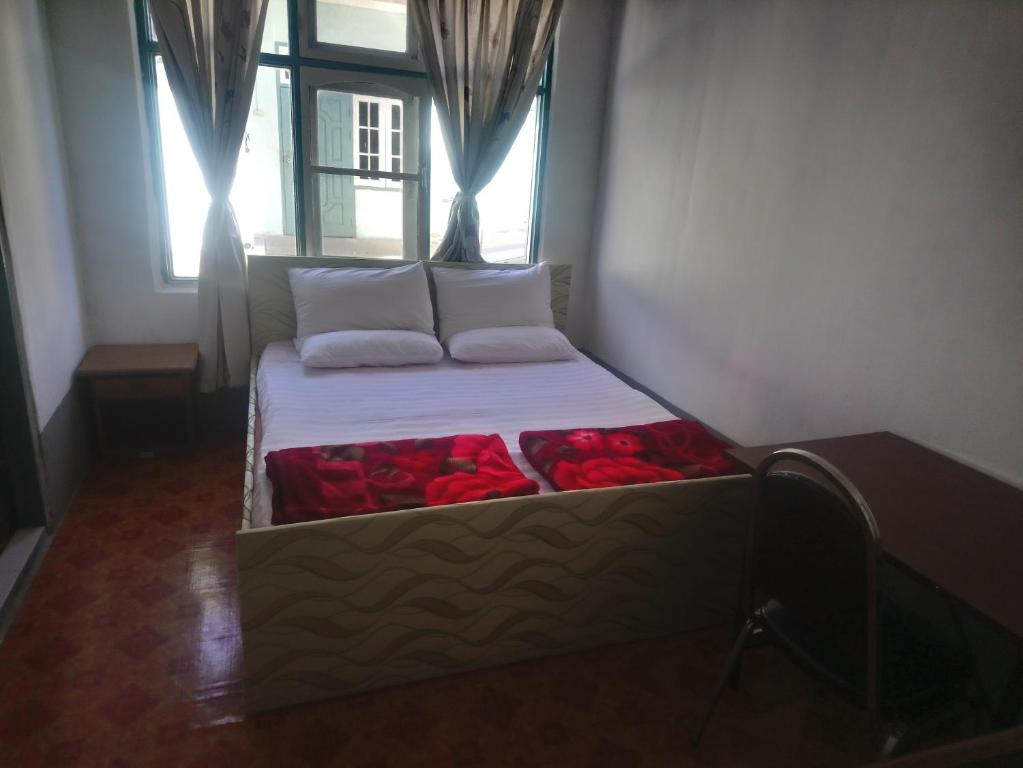 Postel nebo postele na pokoji v ubytování Diamond Star Guest House