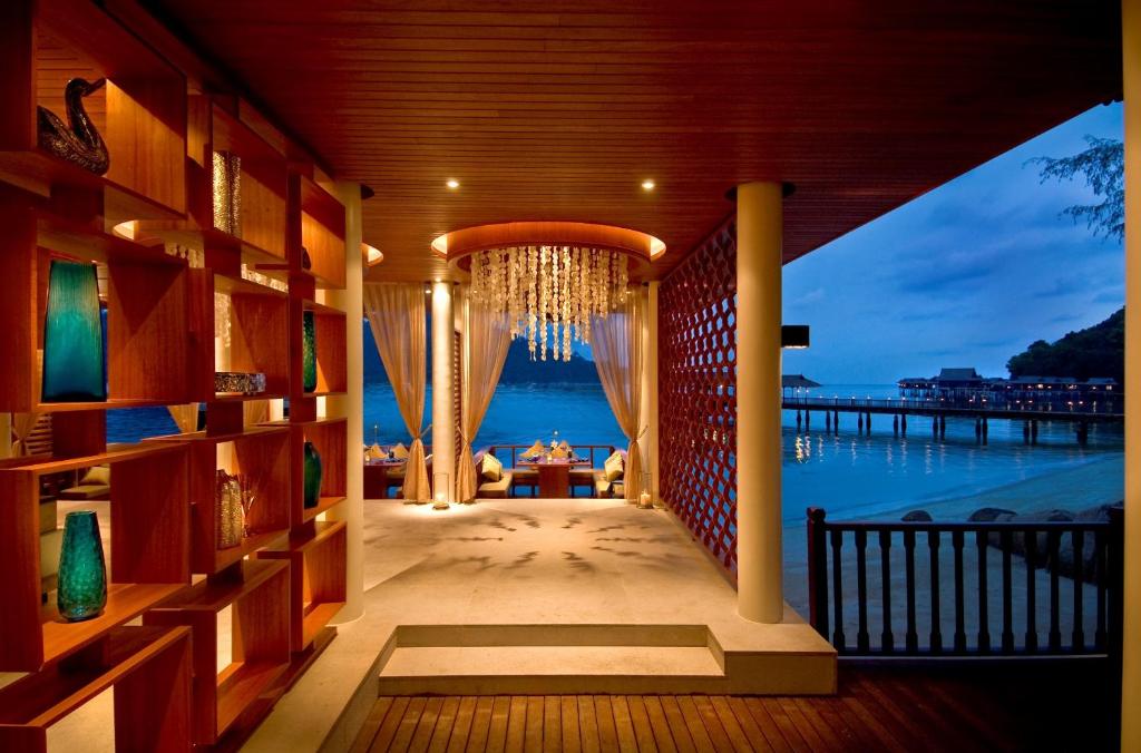 Postel nebo postele na pokoji v ubytování Pangkor Laut Resort - Small Luxury Hotels of the World