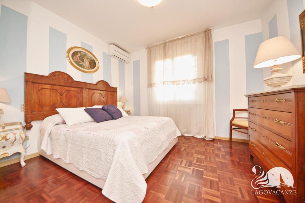 Posteľ alebo postele v izbe v ubytovaní Vista Lago
