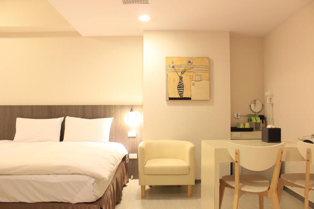 Postel nebo postele na pokoji v ubytování Sunnyside Hotel