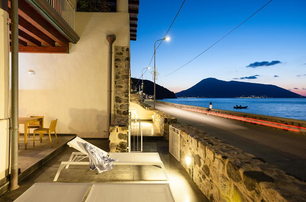 a house with a view of the water at NerOssidiana in Acquacalda